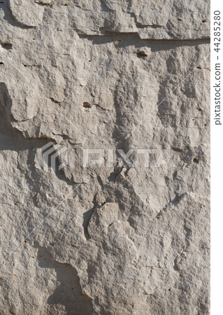 Natural limestone background textured rock face wallpaper 44285280