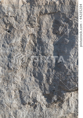 Natural limestone background textured rock face wallpaper Natural limestone background textured rock face wallpaper 44285284