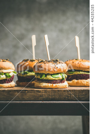 Vegan burgers with beetroot patties and green sprouts 44285285