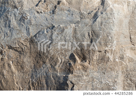 Natural limestone background textured rock face wallpaper Natural limestone background textured rock face wallpaper 44285286