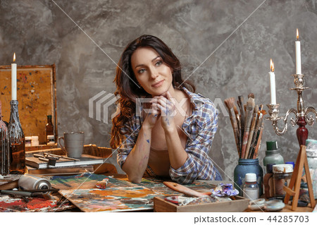 The Attractive Girl Brunette With Long Hair Is Stock Photo