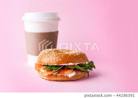 bagel with salmon and paper cup bagel with salmon and paper cup 44286391