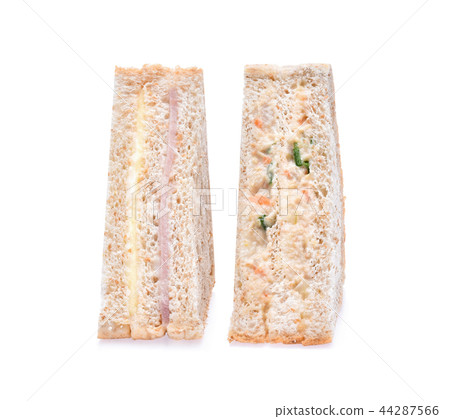 sandwich with ham, tuna and vegetables on white  44287566