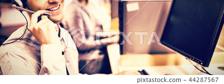 Assistant using a headset Assistant using a headset 44287567