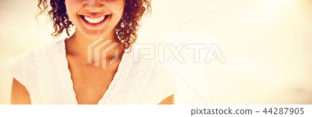 Happy woman at beach 44287905