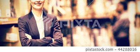 Female manager with arms crossed 44288016