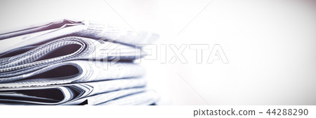 Stacks of newspapers Stacks of newspapers 44288290