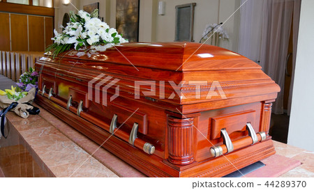 funeral casket in a hearse or chapel 44289370