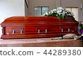 funeral casket in a hearse or chapel 44289380