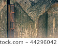 Old wooden window hinges in the morning 44296042