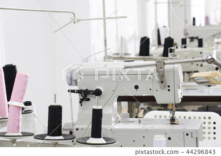 a row of sewing machine in tailor workplace a row of sewing machine in tailor workplace 44296843