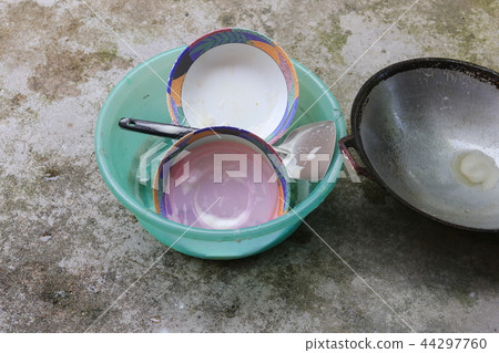 washing dishes in sink plastic green washing dishes in sink plastic green 44297760