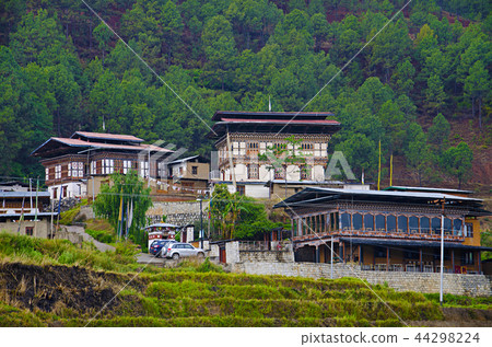 Bhutanese houses near Chimi Lhakhang. Lobesa 44298224