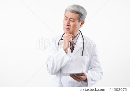 Male doctor portrait, hospital consultation Male doctor portrait, hospital consultation 44302073