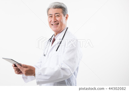 Male doctor portrait, hospital consultation Male doctor portrait, hospital consultation 44302082