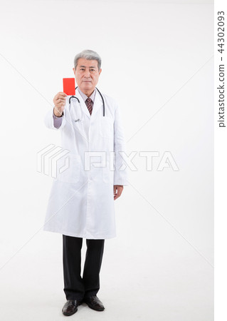 Male doctor portrait, hospital consultation 44302093