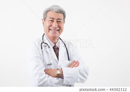 Male doctor portrait, hospital consultation Male doctor portrait, hospital consultation 44302112