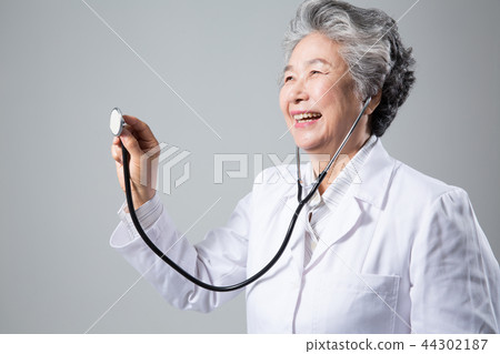 Female doctor portrait, hospital examination consultation 44302187