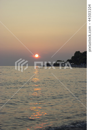 Romantic sunset over a seaport in Brela Croatia 44303104