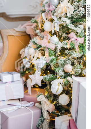 Christmas gift or present box wrapped in kraft paper 44304612