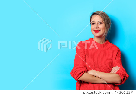 Portrait of a young girl in red sweater  44305137