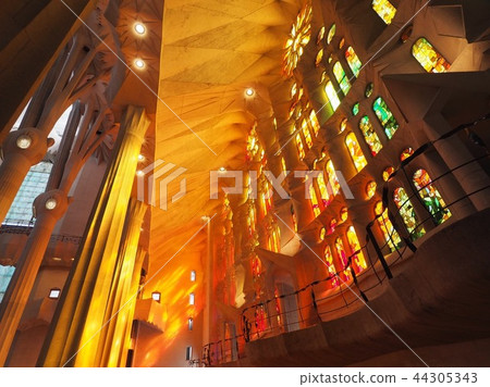 Travel in Spain: stained glass and light inside the Sagrada Familia 44305343