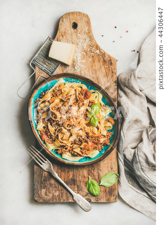 Italian traditional pasta dinner with tagliatelle bolognese, top view Italian traditional pasta dinner with tagliatelle bolognese, top view 44306447
