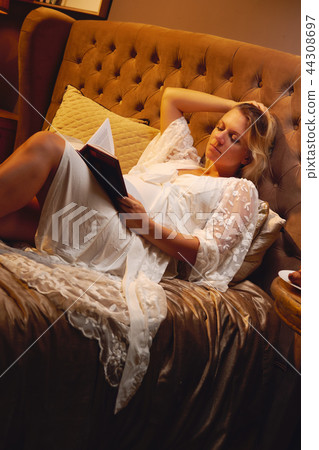 Pregnant woman at home Pregnant woman at home 44308697