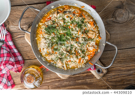 Fried chicken pieces with vegetables. Fried chicken pieces with vegetables. 44309810