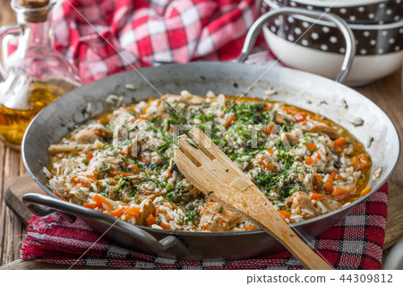 Fried chicken pieces with vegetables. Fried chicken pieces with vegetables. 44309812