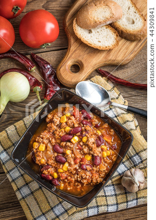 Chili con carne in a bowl. 44309841