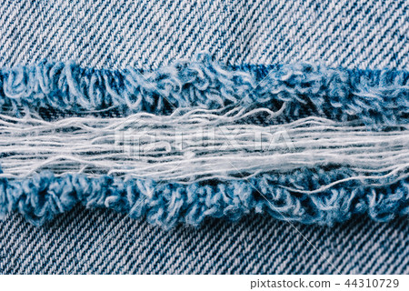 Denim Texture Of Torn Up Jeans Denim Texture Of Torn Up Jeans 44310729