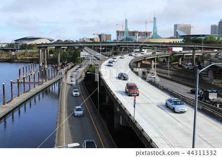 Portland, Oregon expressway by Willamette River 44311332