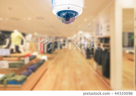 CCTV around safety security on store background. CCTV around safety security on store background. 44320096