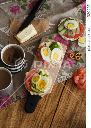 Toast with avocado butter and egg Toast with avocado butter and egg 44320905