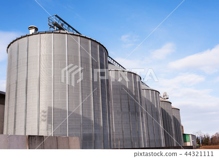 Agricultural silos on blue sky. Agricultural silos on blue sky. 44321111