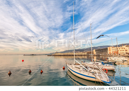 Pleasure boats moored in the harbor. 44321211