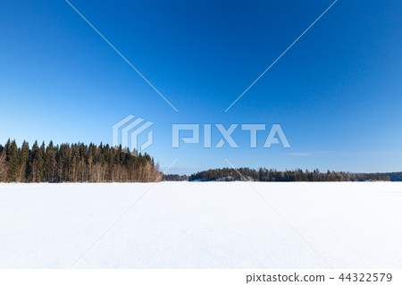 Frozen lake under deep blue sky 44322579