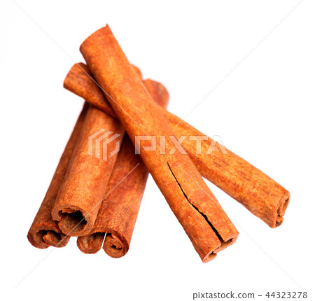 Cinnamon sticks isolated on white background. High resolution photo. Cinnamon sticks isolated on white background. High resolution photo. 44323278