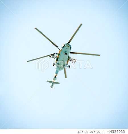 Helicopter in the blue sky Helicopter in the blue sky 44326033