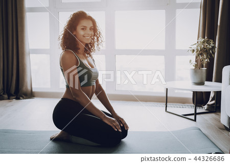 Afro American Young Girl. Home Fitness Concept. 44326686