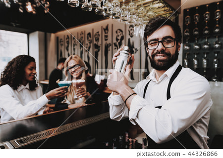 Beard. Barman. Girls. Cocktails. Sit. Bar. Group. Beard. Barman. Girls. Cocktails. Sit. Bar. Group. 44326866