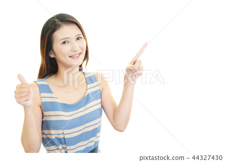 A smiling woman to point A smiling woman to point 44327430