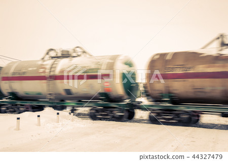 Train with oil tanks moving. 44327479