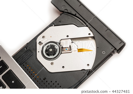 Open optical CD/DVD disc drive on a notebook. 44327481