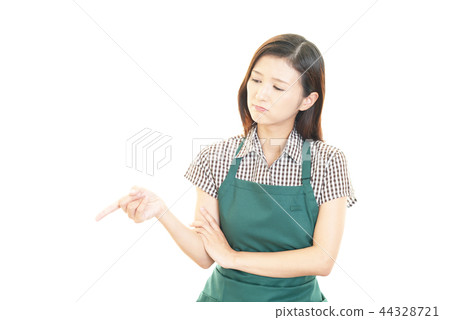 A woman with an unhappy expression 44328721