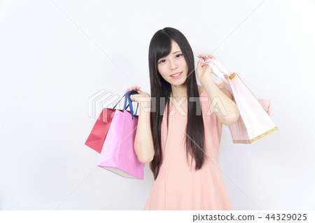 Young woman shopping Young woman shopping 44329025
