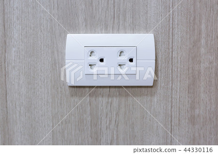 White rubber plug power line is electrical plugged 44330116