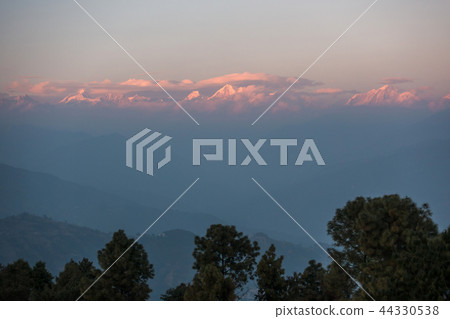 The Himalayas at sunset from Nagarkot in Nepal The Himalayas at sunset from Nagarkot in Nepal 44330538