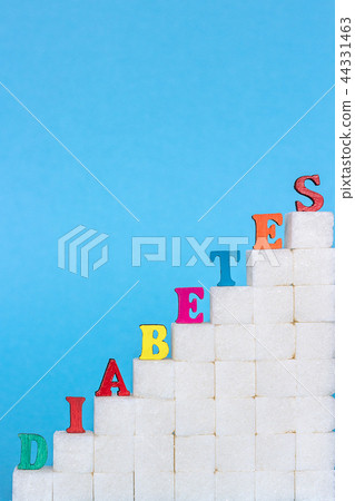diabetes on refined sugar blue background Concept 44331463
